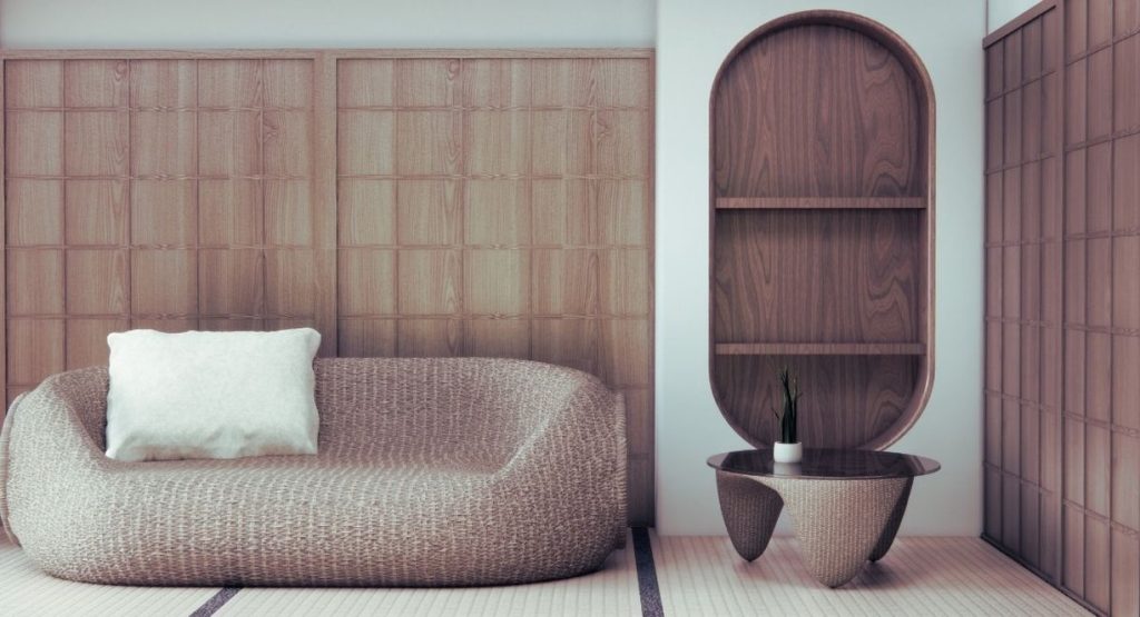 Salon de studio séparé par une cloison en bois style japonais avec fauteuil en bois